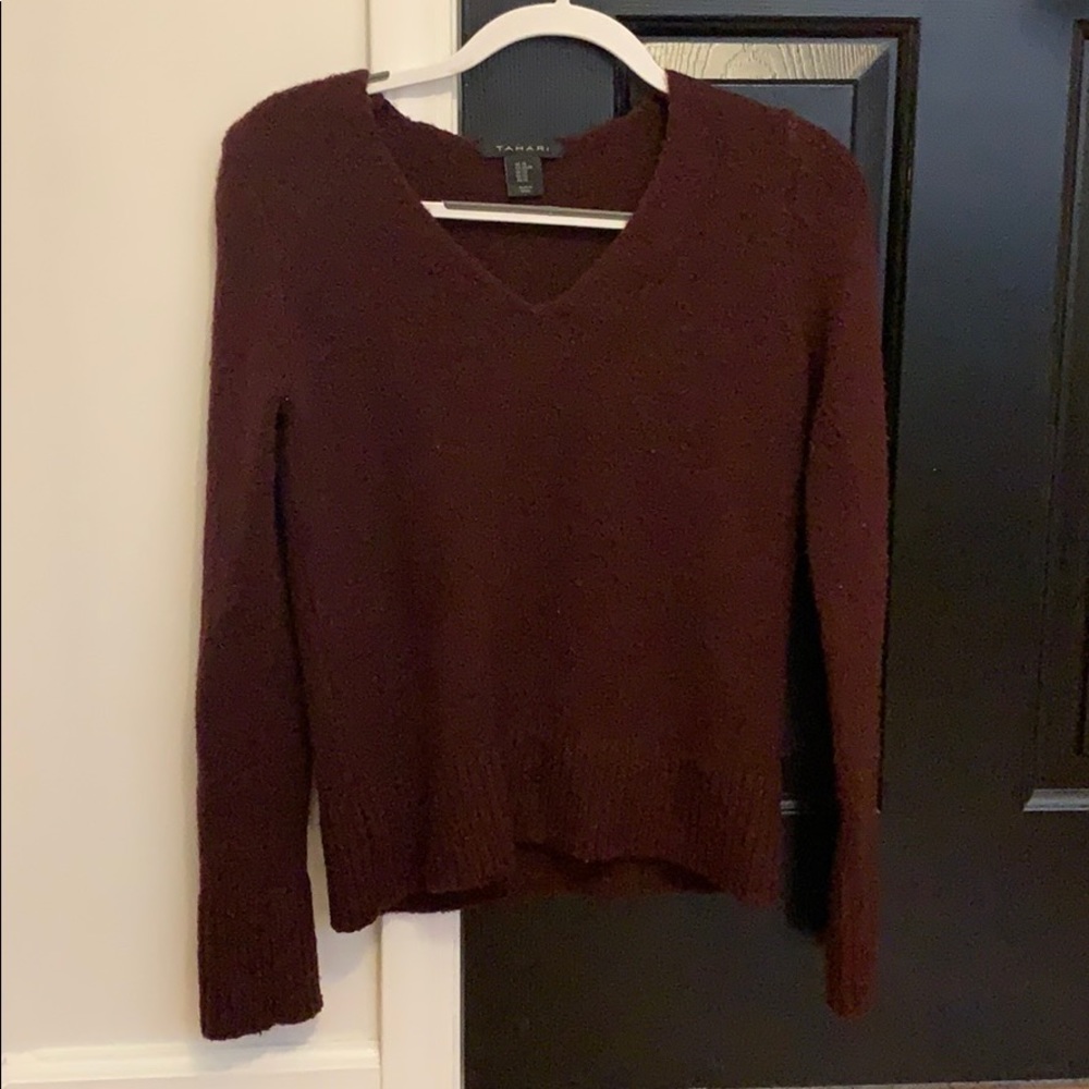 Size XS. V-neck maroon sweater